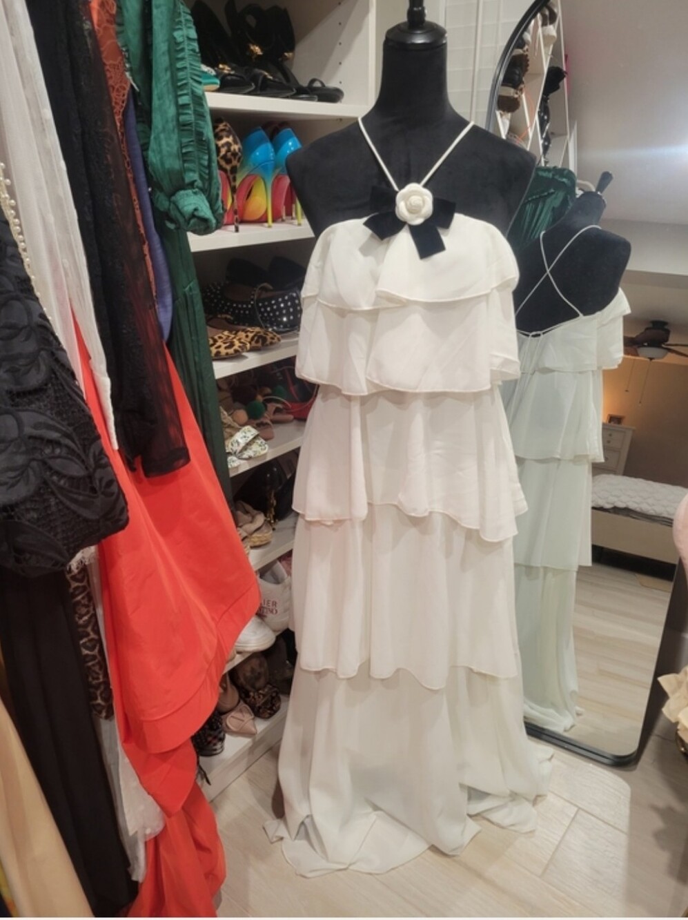 Tiered White Maxi Dress with Black Bow Accent